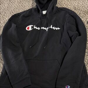 Champion Black Hoodie with White Script and Red Accent